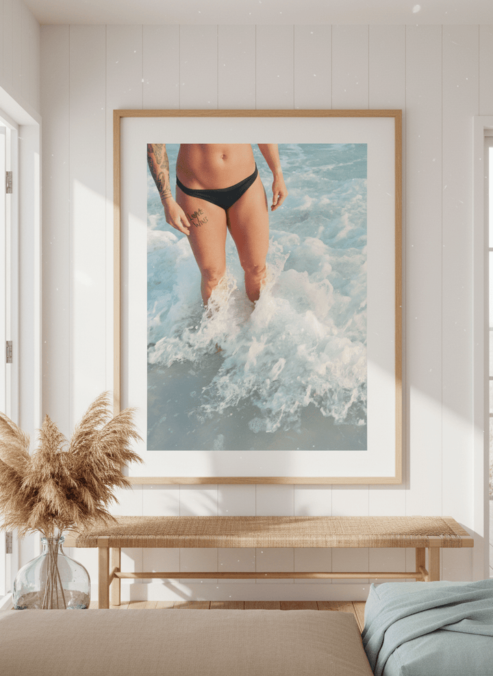 Neutral wall art displayed in a sunny coastal beach house
