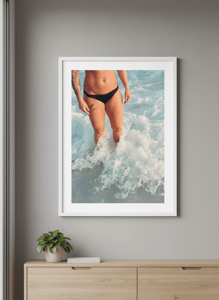 Minimalist artwork displayed in a calm, light-filled bedroom interior