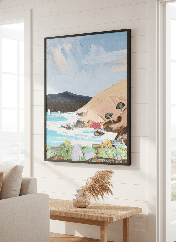 Neutral wall art displayed in a sunny coastal beach house