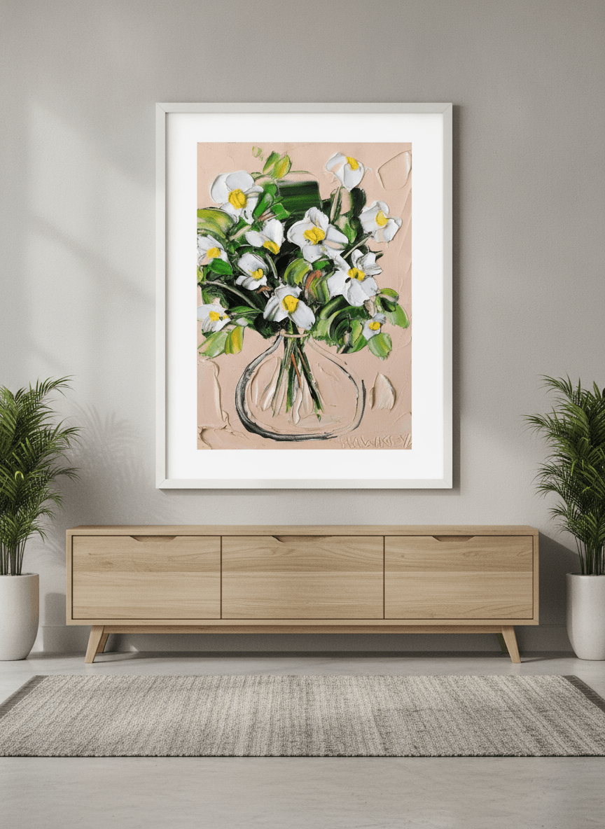 Wall art styled above a dining table in a contemporary home