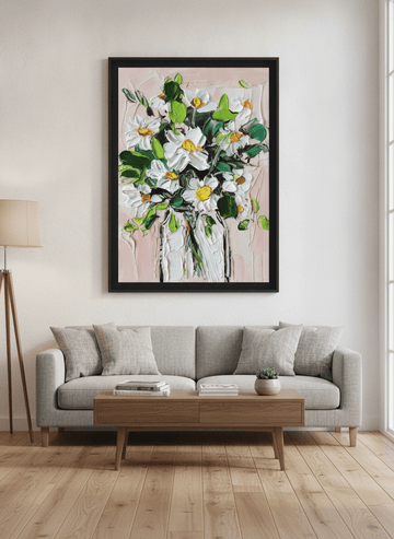 Modern wall art styled above a sofa in a neutral living room