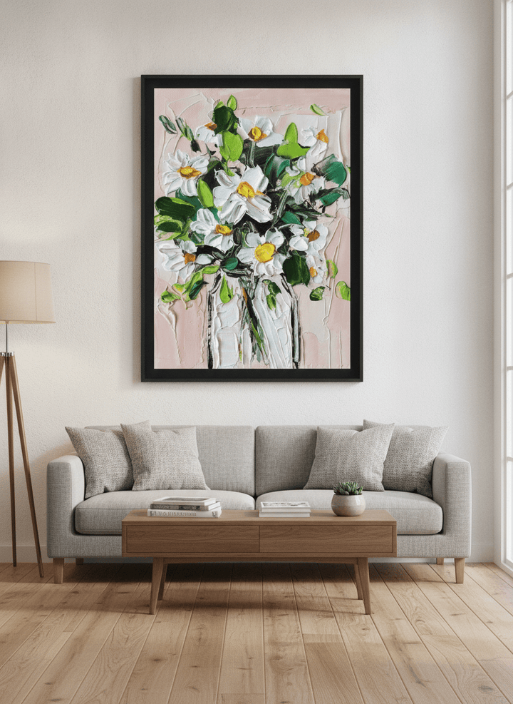 Modern wall art styled above a sofa in a neutral living room