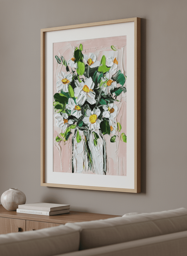 Modern wall art styled above a sofa in a neutral living room