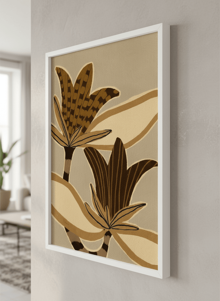 Modern wall art styled above a sofa in a neutral living room