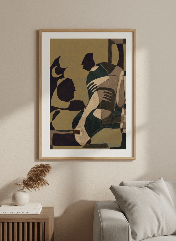 Modern wall art styled above a sofa in a neutral living room