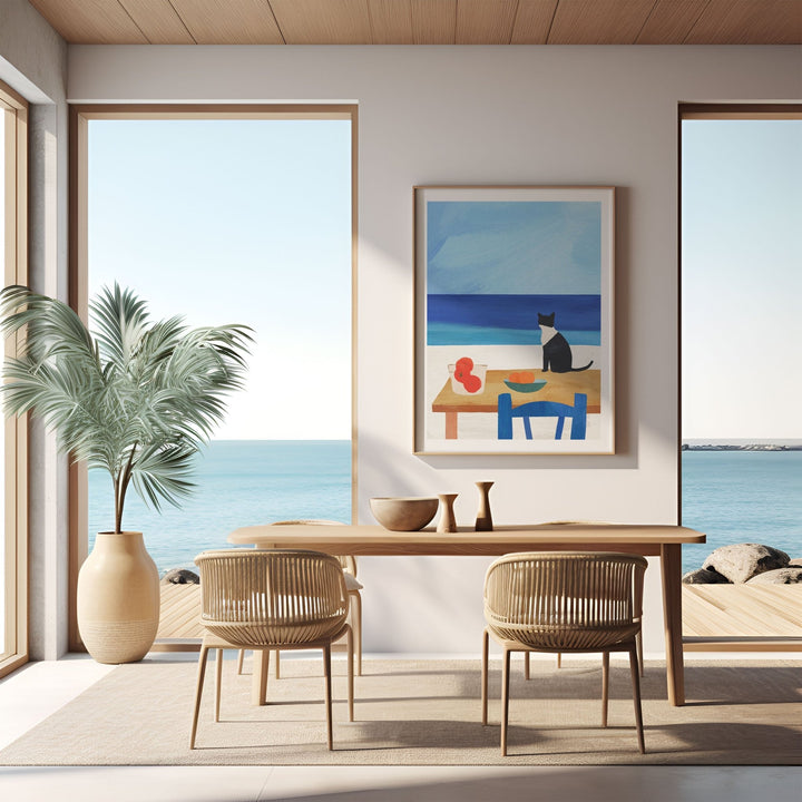 Modern dining room with ocean view, wooden table, and chairs.