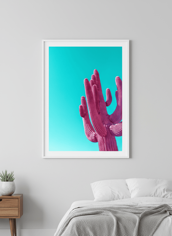 Minimalist artwork displayed in a calm, light-filled bedroom interior