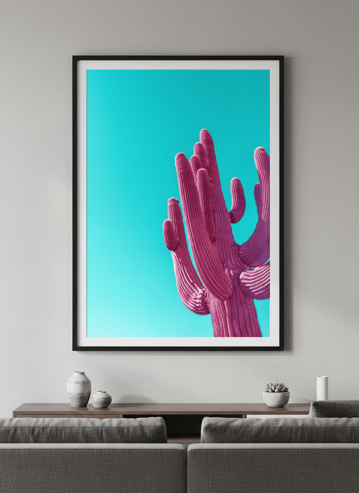 Modern wall art styled above a sofa in a neutral living room