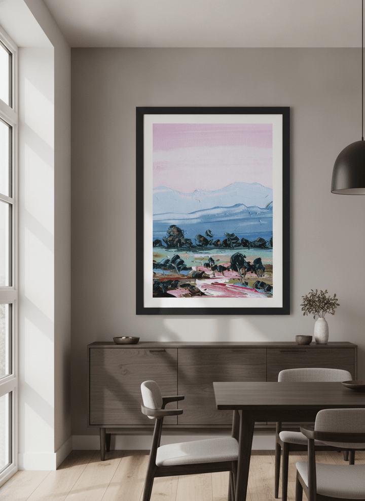 Wall art styled above a dining table in a contemporary home