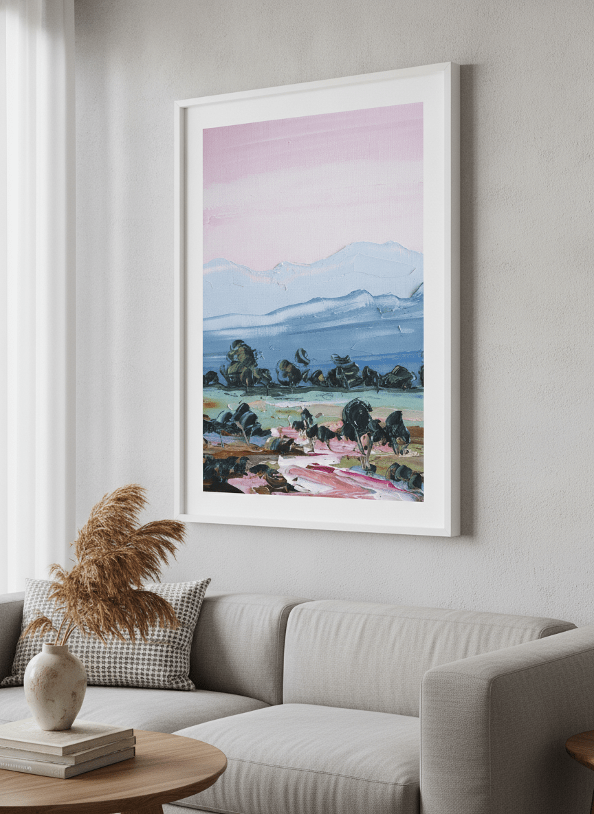Modern wall art styled above a sofa in a neutral living room