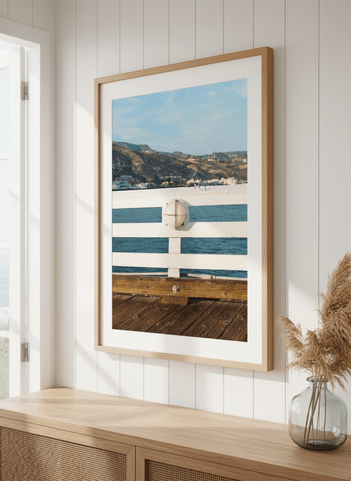 Neutral wall art displayed in a sunny coastal beach house