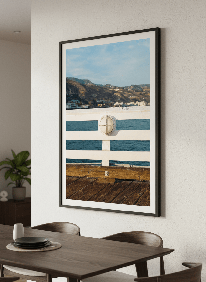 Wall art styled above a dining table in a contemporary home