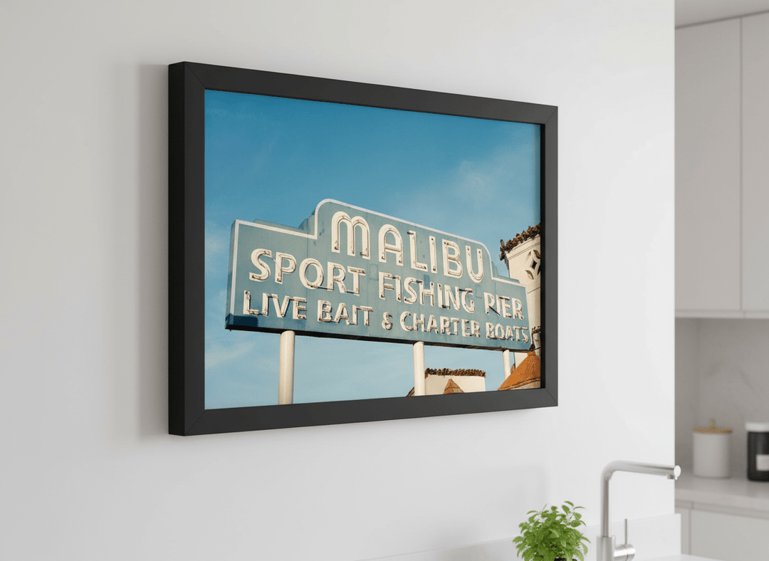 Artwork styled on the wall of a bright modern kitchen