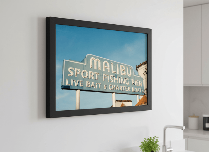 Artwork styled on the wall of a bright modern kitchen