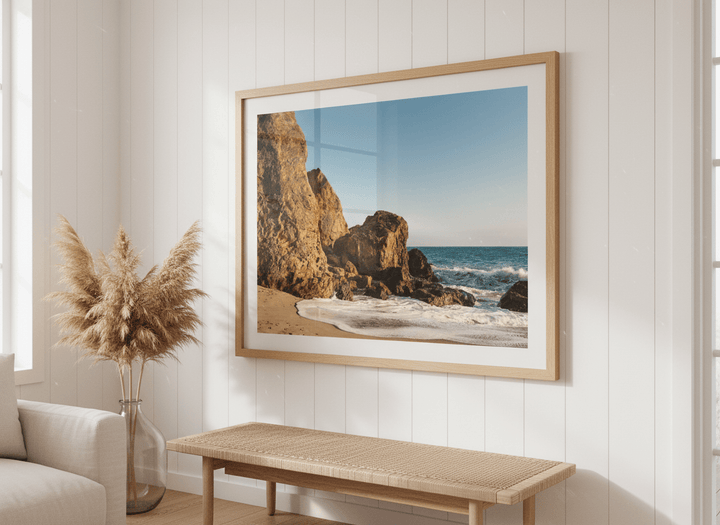 Neutral wall art displayed in a sunny coastal beach house