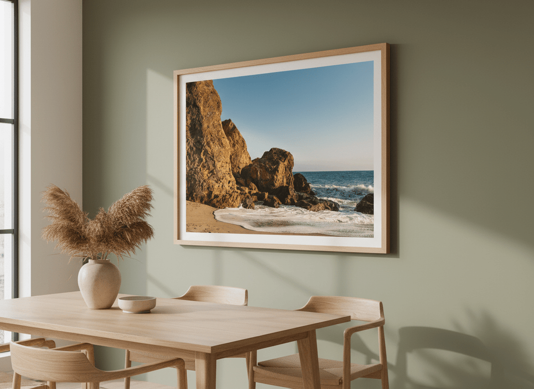 Wall art styled above a dining table in a contemporary home