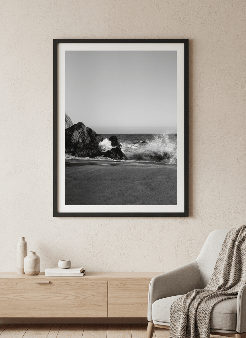 Modern wall art styled above a sofa in a neutral living room