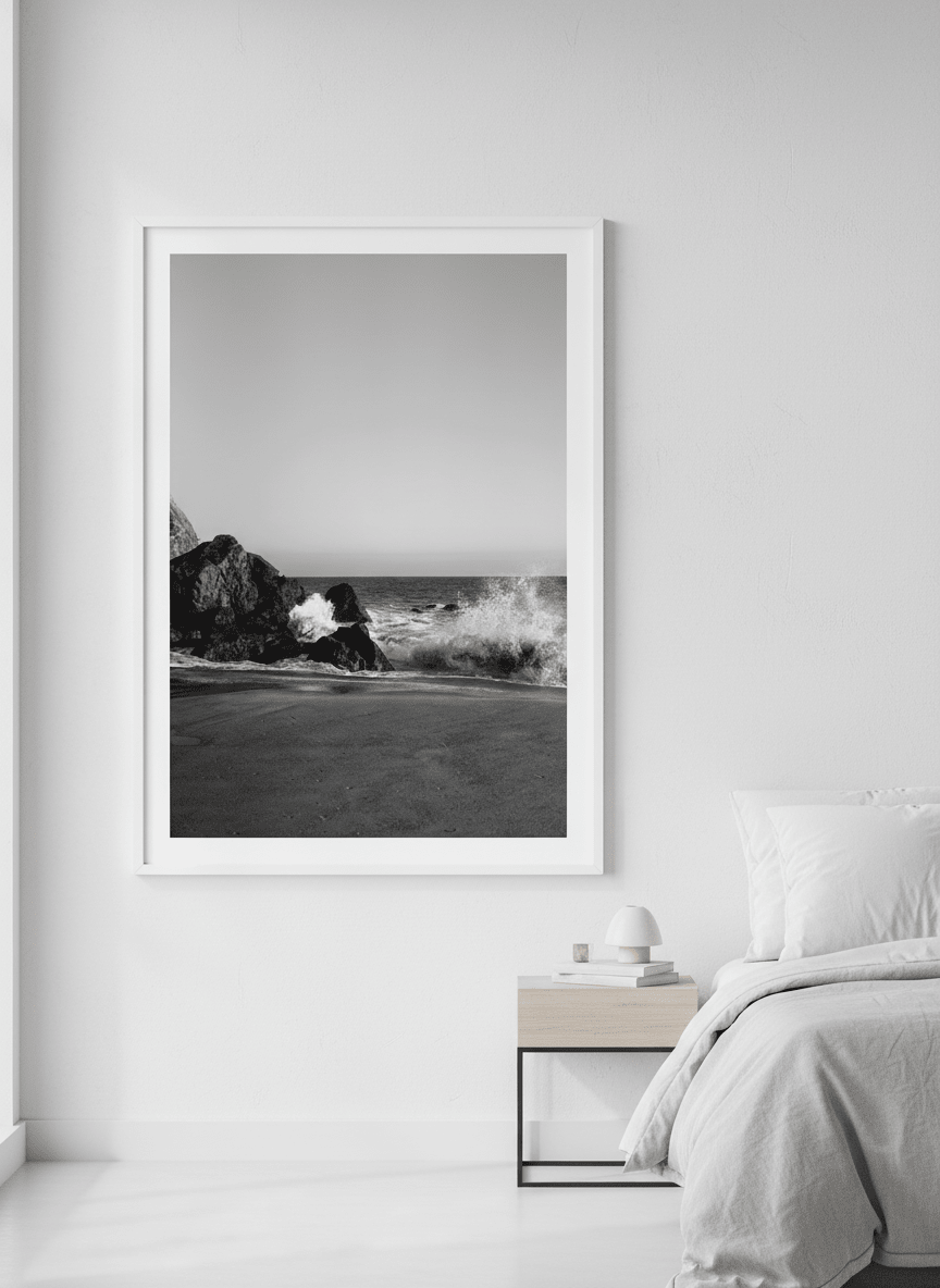 Minimalist artwork displayed in a calm, light-filled bedroom interior