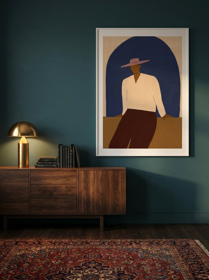 Modern wall art print styled on the wall in a moody living room