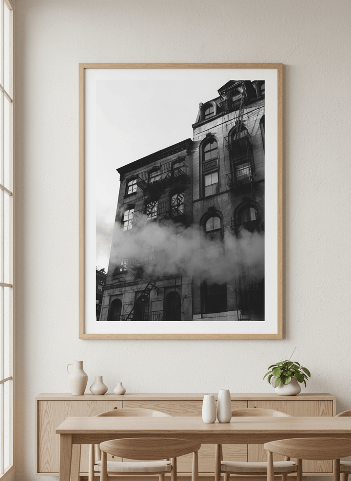 Wall art styled above a dining table in a contemporary home