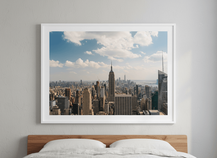 Minimalist artwork displayed in a calm, light-filled bedroom interior