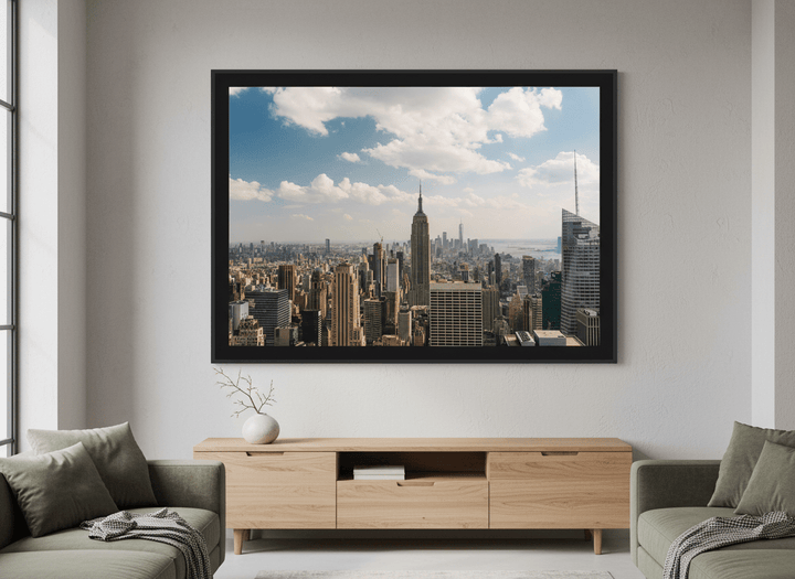 Modern wall art styled above a sofa in a neutral living room