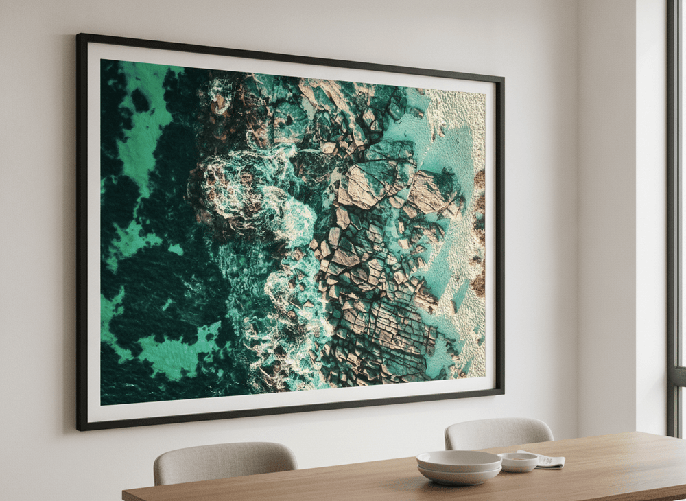 Wall art styled above a dining table in a contemporary home