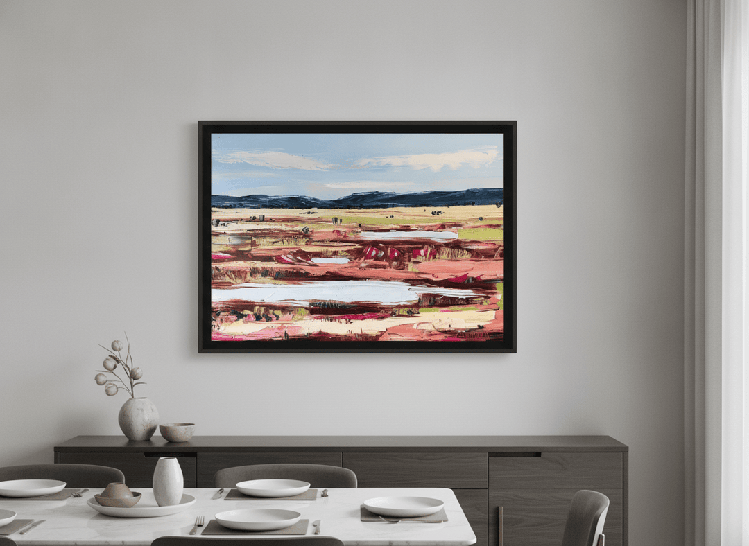 Wall art styled above a dining table in a contemporary home