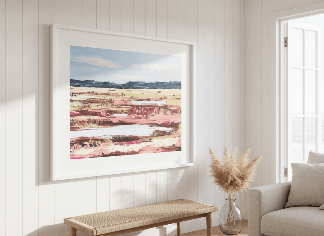 Neutral wall art displayed in a sunny coastal beach house