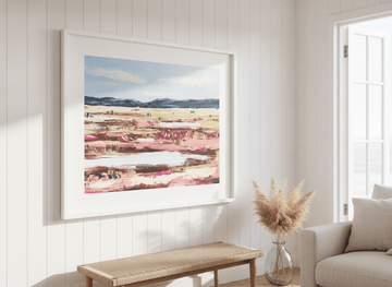 Neutral wall art displayed in a sunny coastal beach house