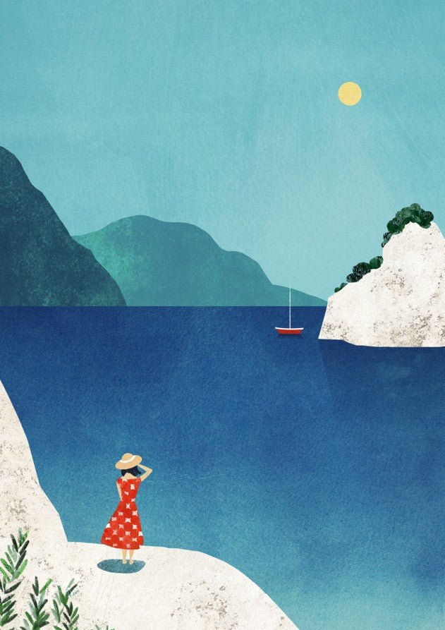 Woman in a red dress standing on a cliff overlooking a blue sea with a sailboat and mountains. framed