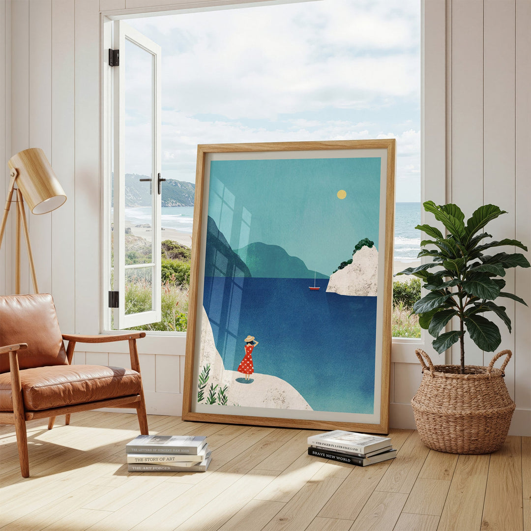 Artwork of a woman by the sea in a modern living room with a window view.