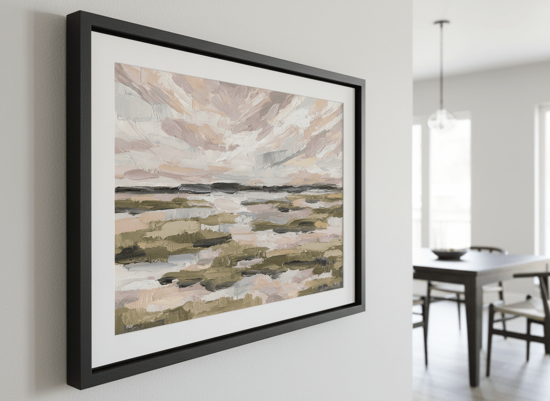 Wall art styled above a dining table in a contemporary home