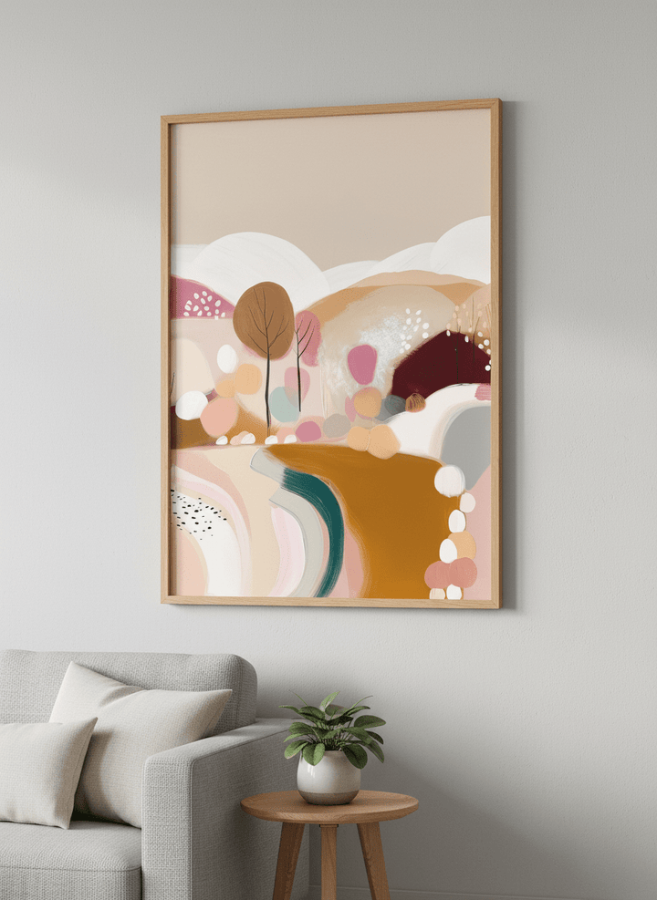 Modern wall art styled above a sofa in a neutral living room