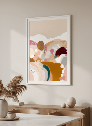 Wall art styled above a dining table in a contemporary home