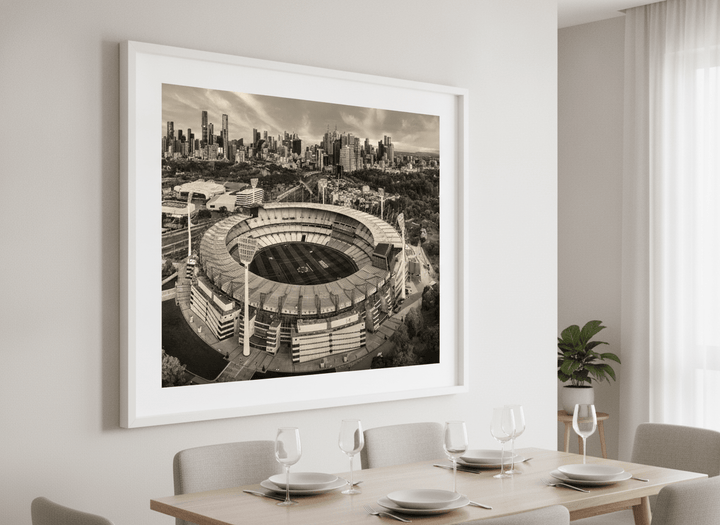 Wall art styled above a dining table in a contemporary home