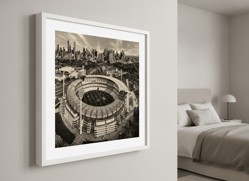 Minimalist artwork displayed in a calm, light-filled bedroom interior