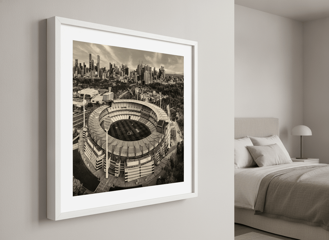 Minimalist artwork displayed in a calm, light-filled bedroom interior