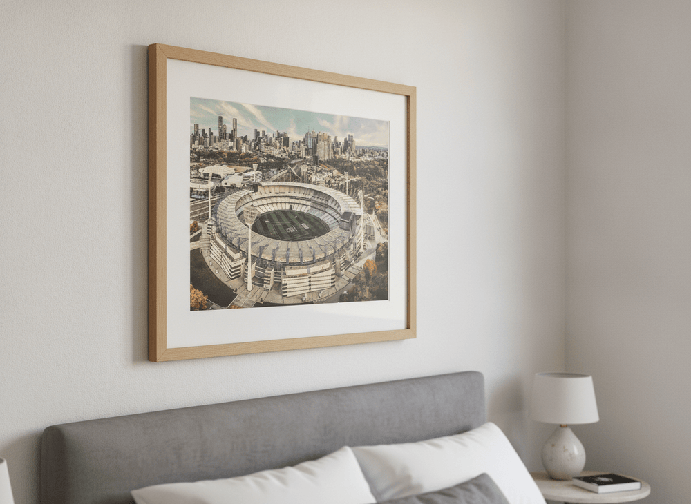 Minimalist artwork displayed in a calm, light-filled bedroom interior