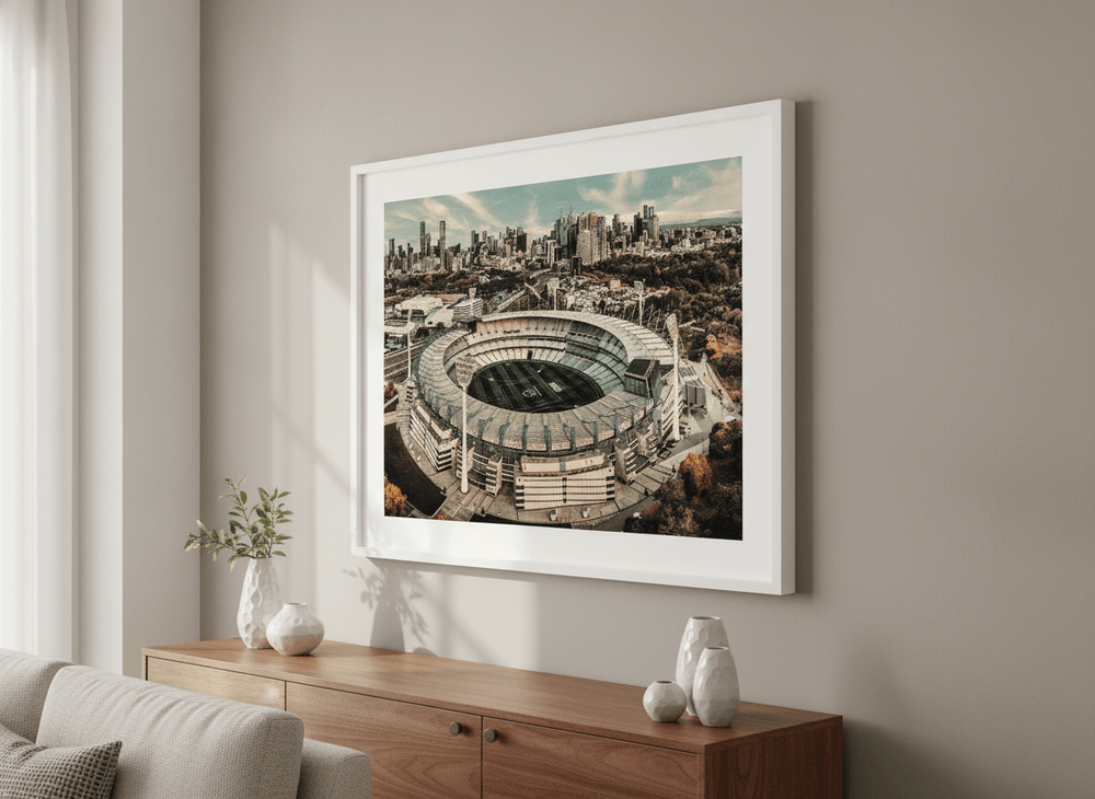 Modern wall art styled above a sofa in a neutral living room