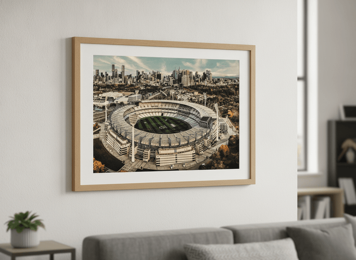 Modern wall art styled above a sofa in a neutral living room