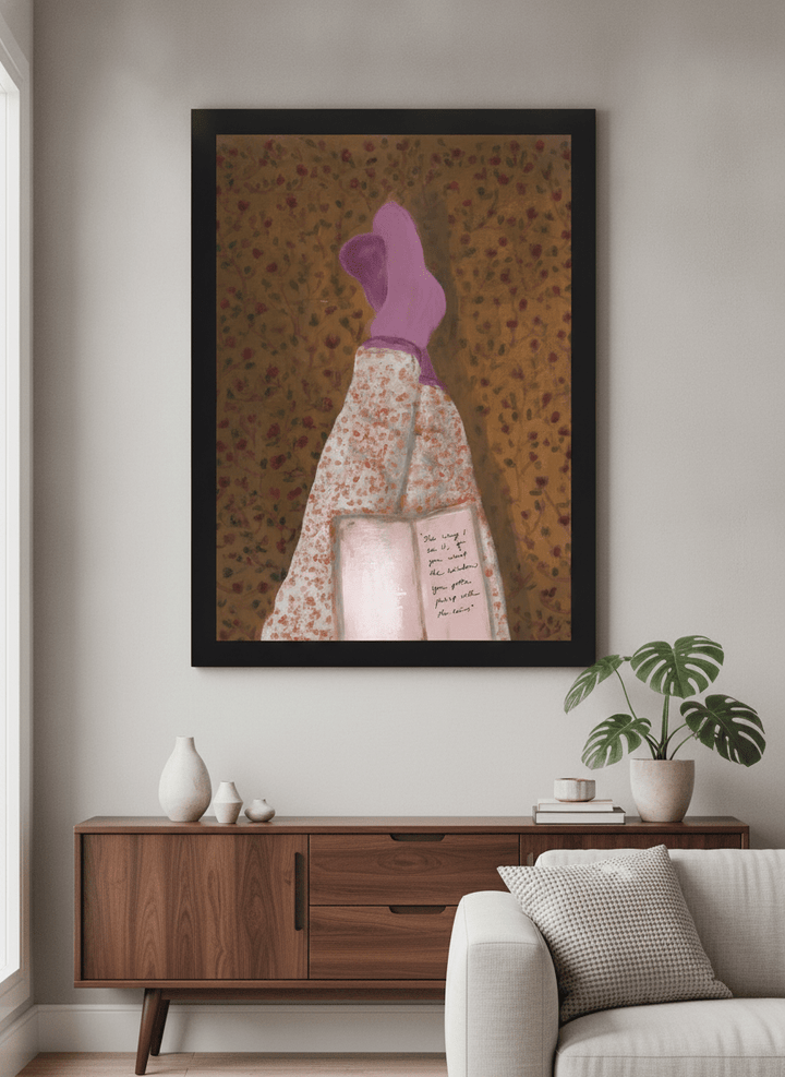 Modern wall art styled above a sofa in a neutral living room