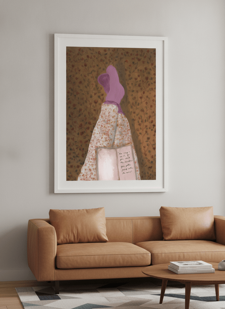Modern wall art styled above a sofa in a neutral living room