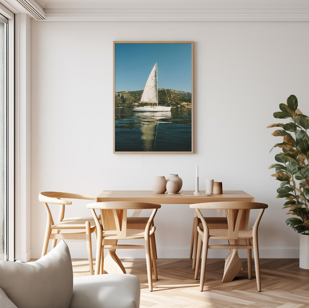sailboat photo above dining table