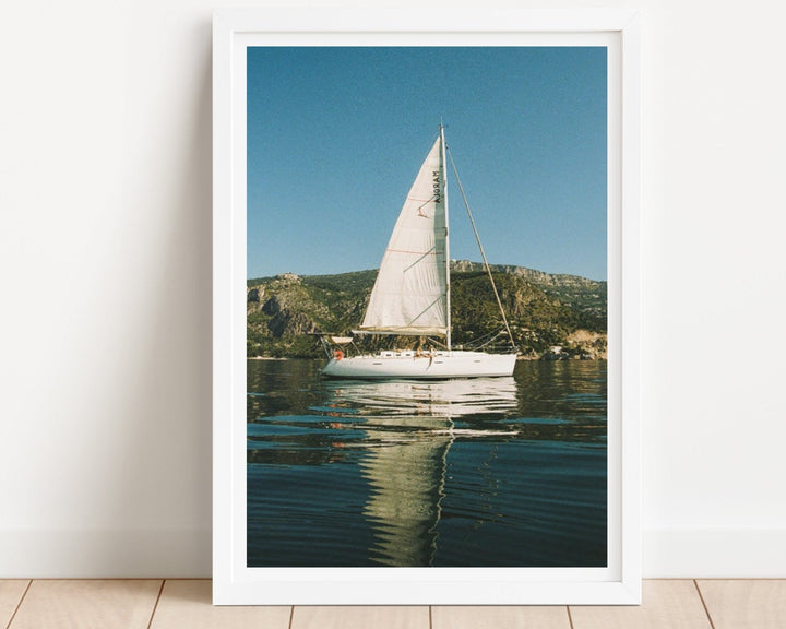 coastal photo leaning against wall 