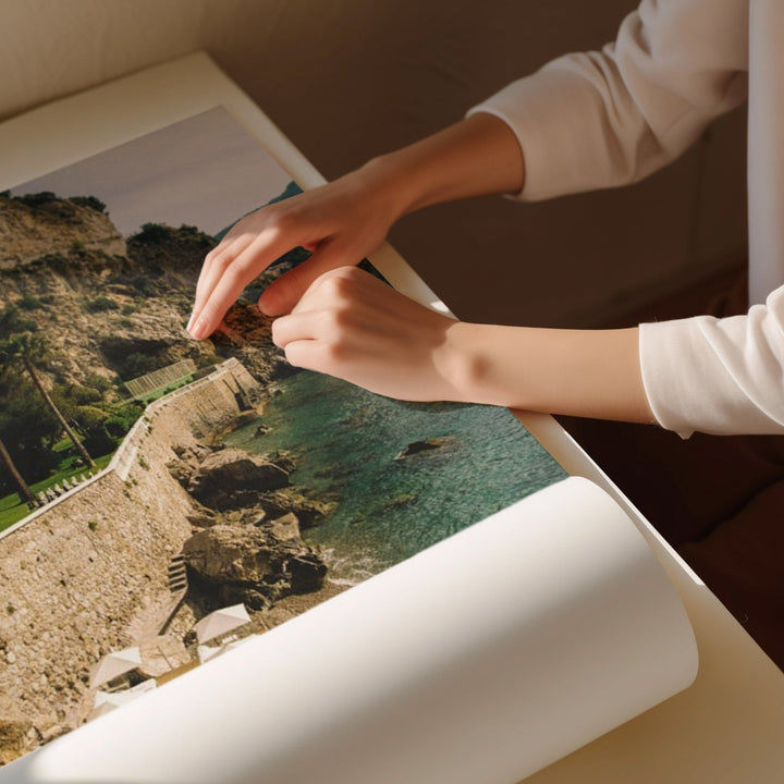 person unrolling photo