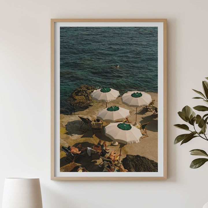 print on wall in a nook with dining table and chair