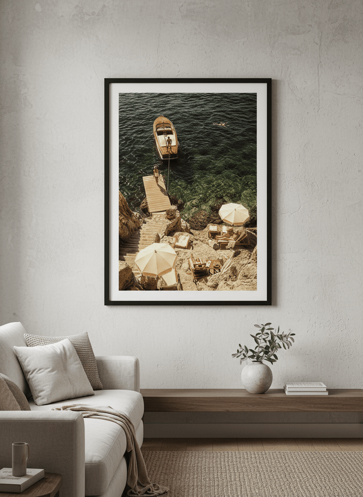 Modern wall art styled above a sofa in a neutral living room
