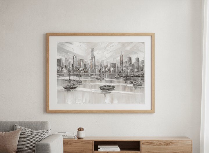 Modern wall art styled above a sofa in a neutral living room