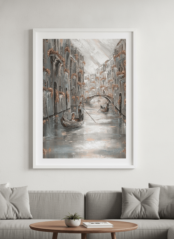 Modern wall art styled above a sofa in a neutral living room
